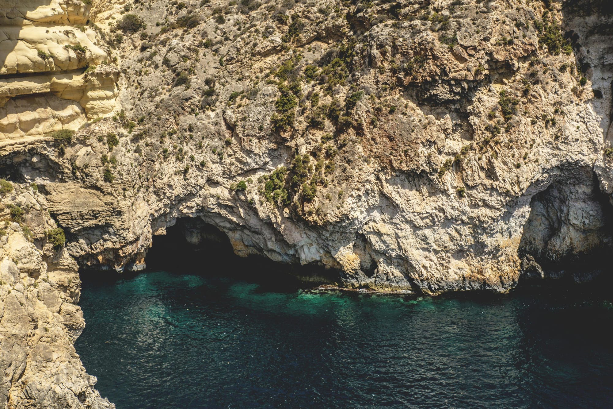 Maltese pale rock formation next to the sea