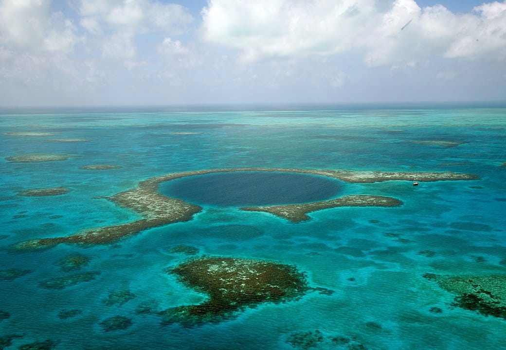 An aerial view of the Great Blue Hole in Belize